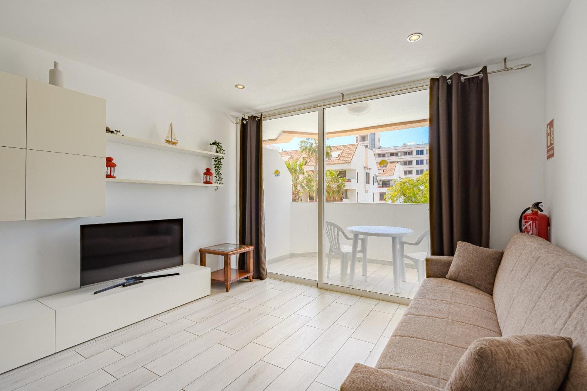 Un dormitorio en Playa de las Américas Costa Adeje  Extérieur photo