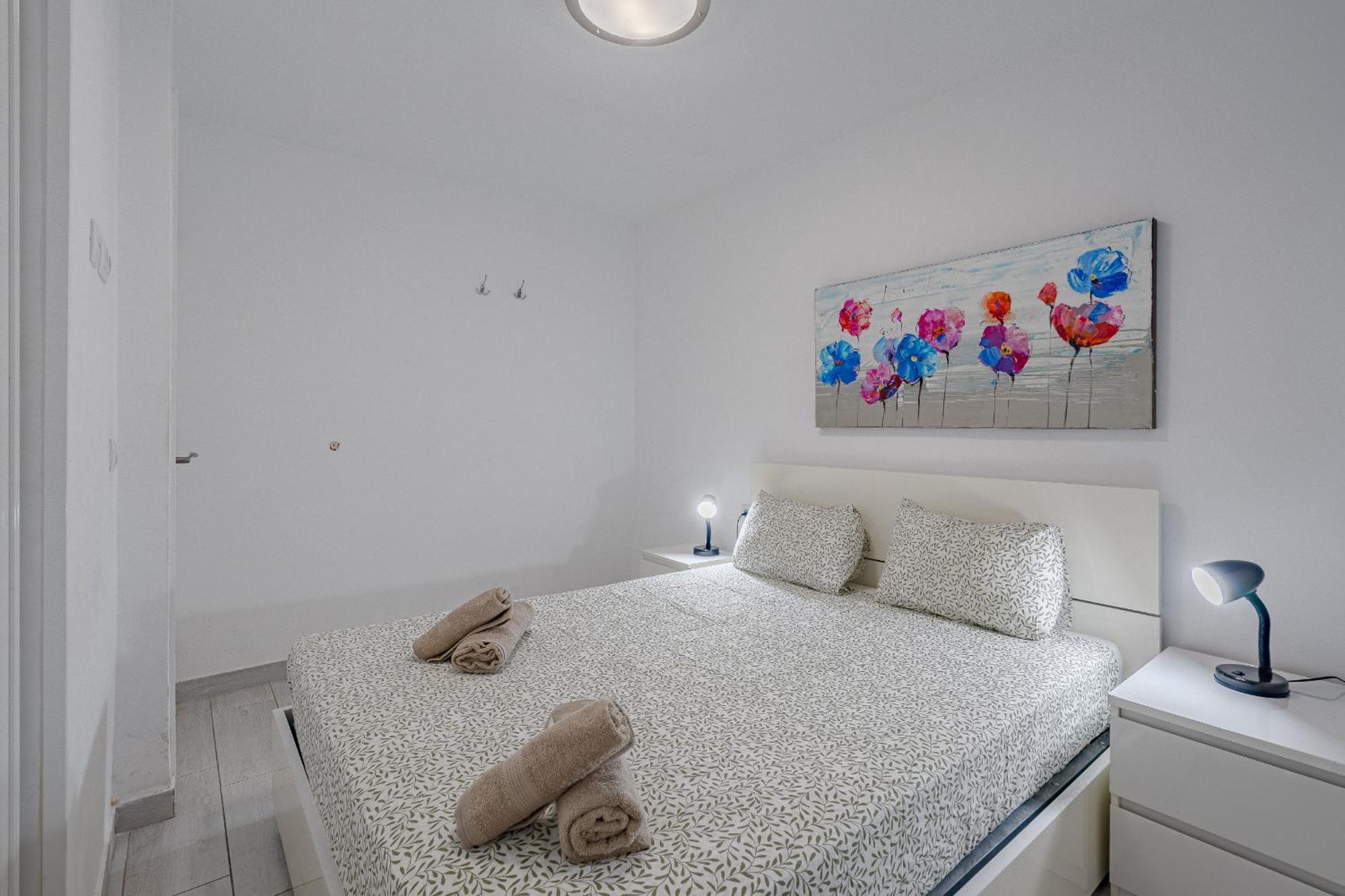 Un dormitorio en Playa de las Américas Costa Adeje  Extérieur photo
