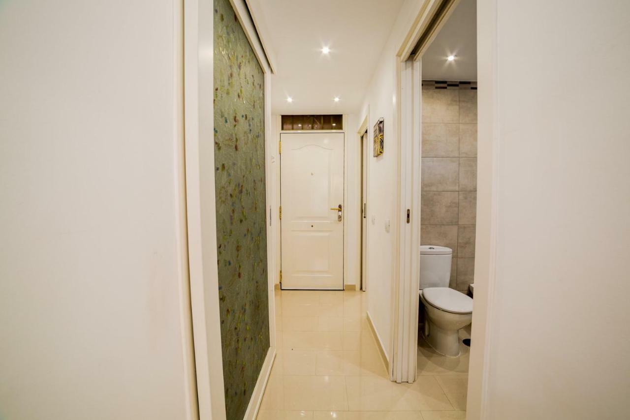 Un dormitorio en Playa de las Américas Costa Adeje  Extérieur photo
