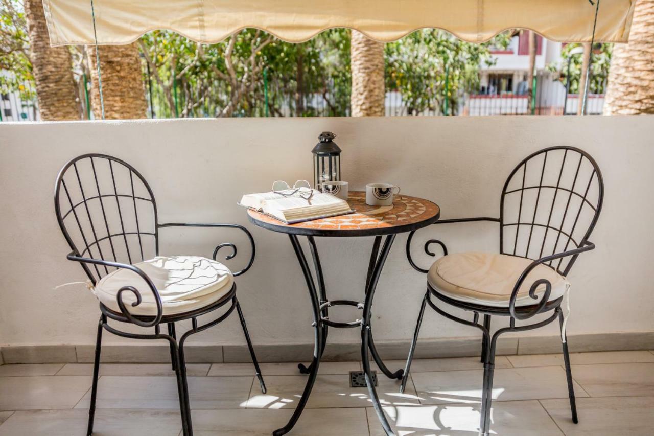 Un dormitorio en Playa de las Américas Costa Adeje  Extérieur photo